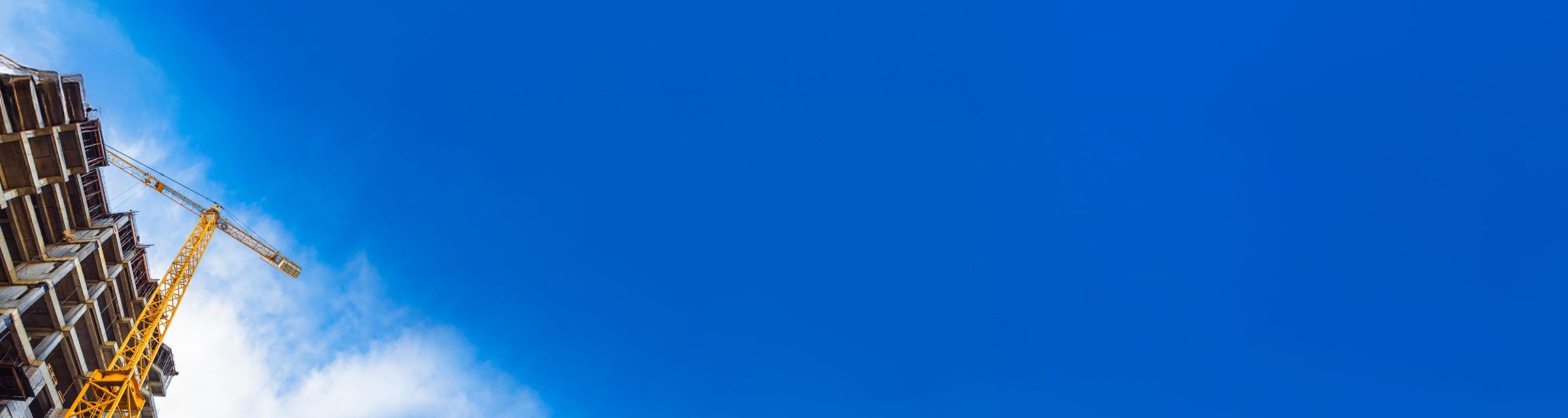 Blue sky and construction crane